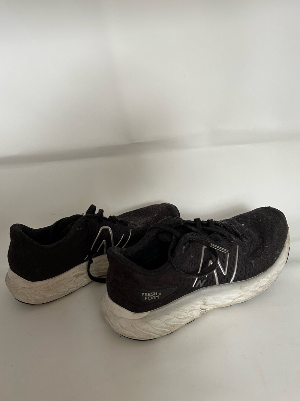 Women’s New Balance Black and White Sneakers